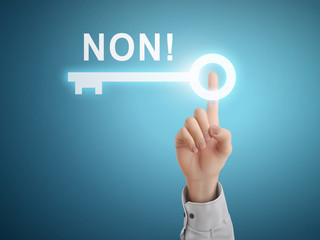 male hand pressing NO word in French