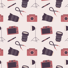 Seamless pattern with photo cameras, lenses and accessories