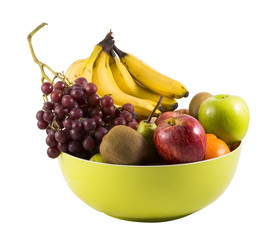 Composition with assorted fruits in  big bowl isolated on white