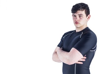 Portrait of a rugby player with arms crossed