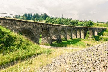 Fototapeta na wymiar Old railway bridge viaduct