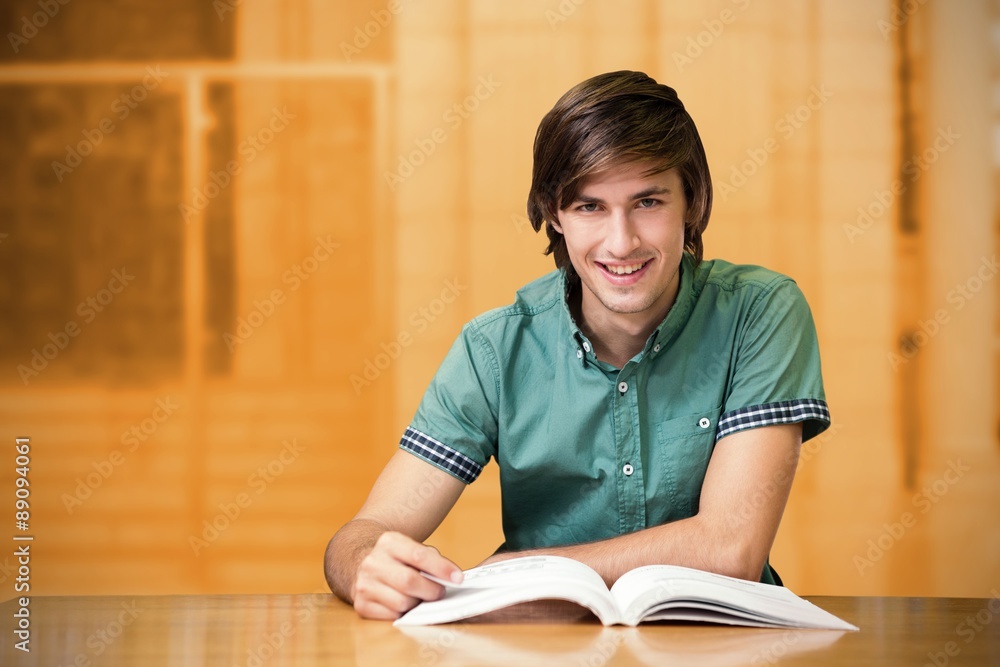 Poster composite image of student sitting in library reading