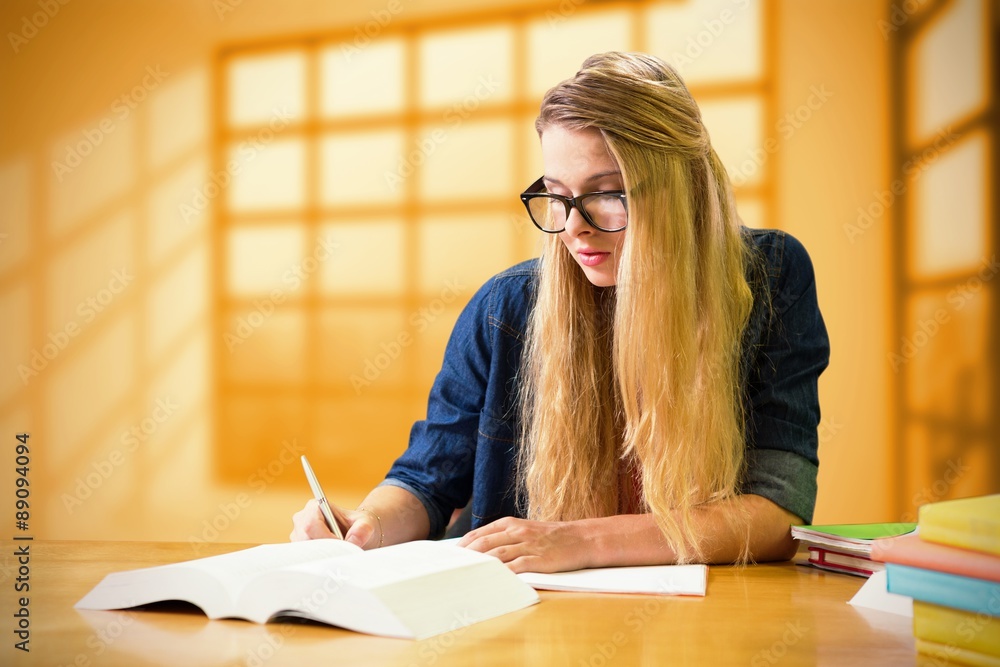 Poster composite image of student studying in the library