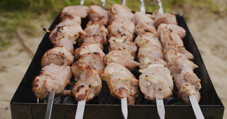 preparing pork shashlik on mangal