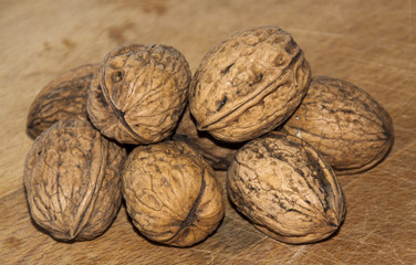 Walnuts on wood board