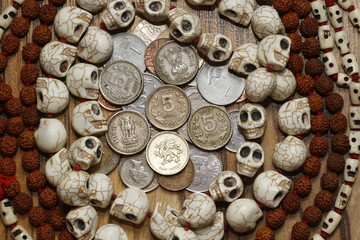 coins, many skulls, rudraksha