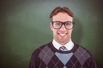 Fototapeta premium Composite image of geeky hipster smiling at camera 