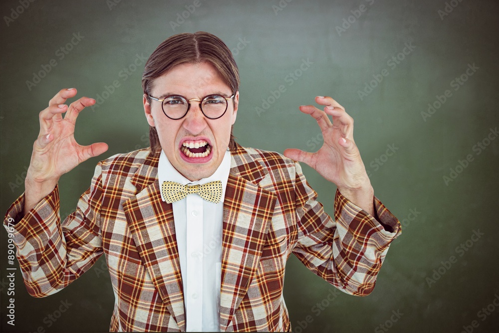 Aufkleber composite image of furious geeky hipster looking at camera