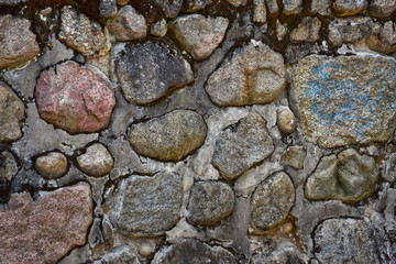 Abstract cobblestone wall texture with big stones