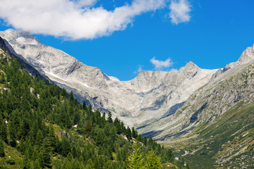 Fototapeta na wymiar National Park of Adamello Brenta - Italy / Peaks and source of the Chiese River in the National Park of Adamello Brenta. Trentino Alto Adige, Italy