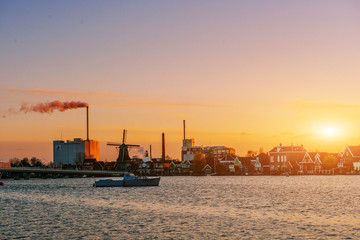 Obraz premium Comfortable houses at sunset.