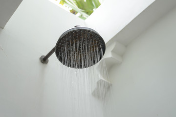 close up on head of antique rain shower outdoor