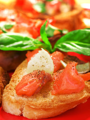Bruschettas with salmon and onion