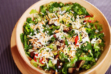 Fresh green salad with cheddar and cherry tomatoes