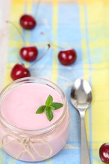 Cherry yogurt and ripe cherry