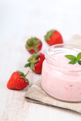 Strawberry yogurt and ripe strawberry