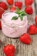 Strawberry yogurt and ripe strawberry