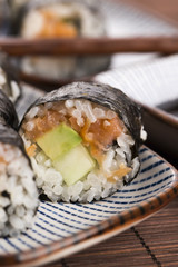 Sushi - Salmon rolls served on a plate