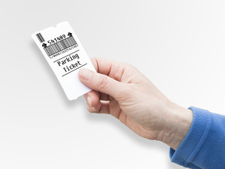 Female hand holds a parking ticket