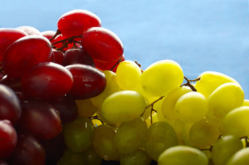 brush of green and red grapes