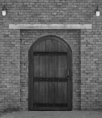 wood door with brick wall