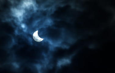 Naklejka na ściany i meble Partial Solar Eclipse on a Cloudy Day 20.03.2015