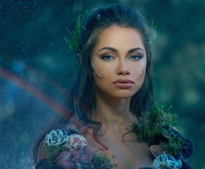 Elf woman in a magical forest