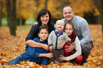 happy family in autumn park