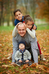 Fototapeta premium happy family in autumn park
