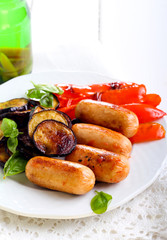 Roasted sausages, aubergine and  pepper