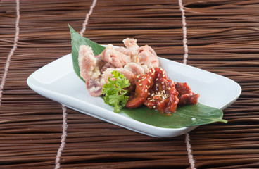 japanese cuisine. fried squid on the background