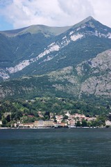 Fototapeta na wymiar Lake Como view towards Menaggio under blue sky in Lombardy Italy 