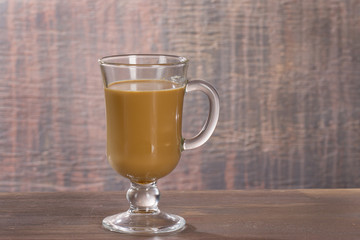 cup of cappuccino on table