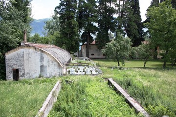 Fototapeta na wymiar Old destroyed greenhouse in Italy 