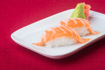 japanese cuisine. sushi salmon on the background
