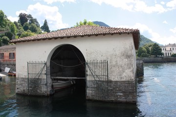Holiday on the beautiful Lake Como under blue sky in Lombardy Italy
