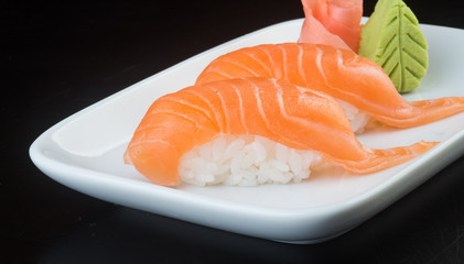 japanese cuisine. sushi salmon on the background
