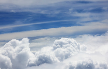 Aerial view of Blue sky and Clouds Top view from airplane window