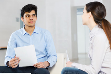 Obraz premium Two young people working as partners