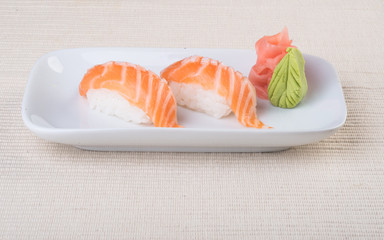 japanese cuisine. sushi salmon on the background