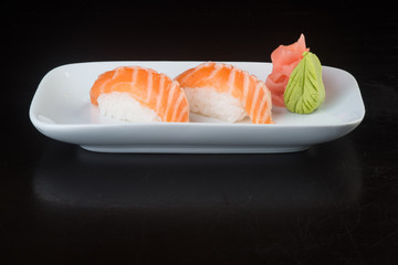 japanese cuisine. sushi salmon on the background
