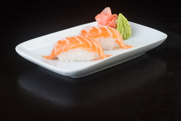 japanese cuisine. sushi salmon on the background