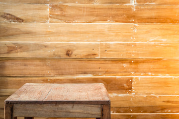 Empty top wooden table and wooden wall background