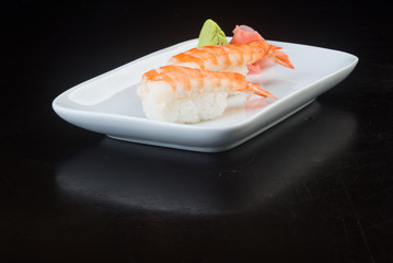 japanese cuisine. sushi shrimp on the background