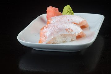 japanese cuisine. sushi salmon on the background