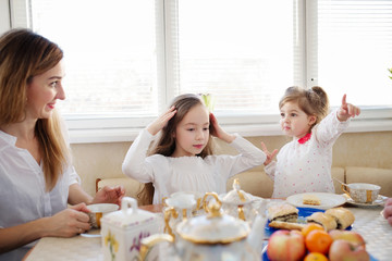 family has breakfast in the morning