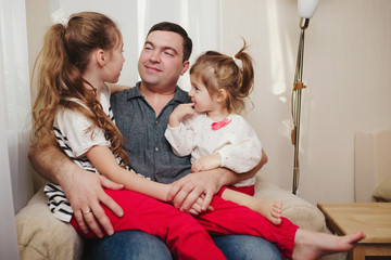 father with daughter at home