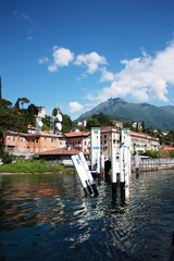 Fototapeta na wymiar Menaggio Pier for car ferry at the Lake Como in Lombardy, Italy 
