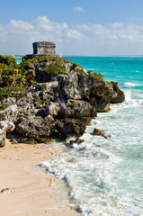 Ancient Mayan ruins in Tulum on the beach of Caribbean turquoise sea 
