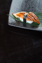 japanese cuisine. sushi unagi on the background